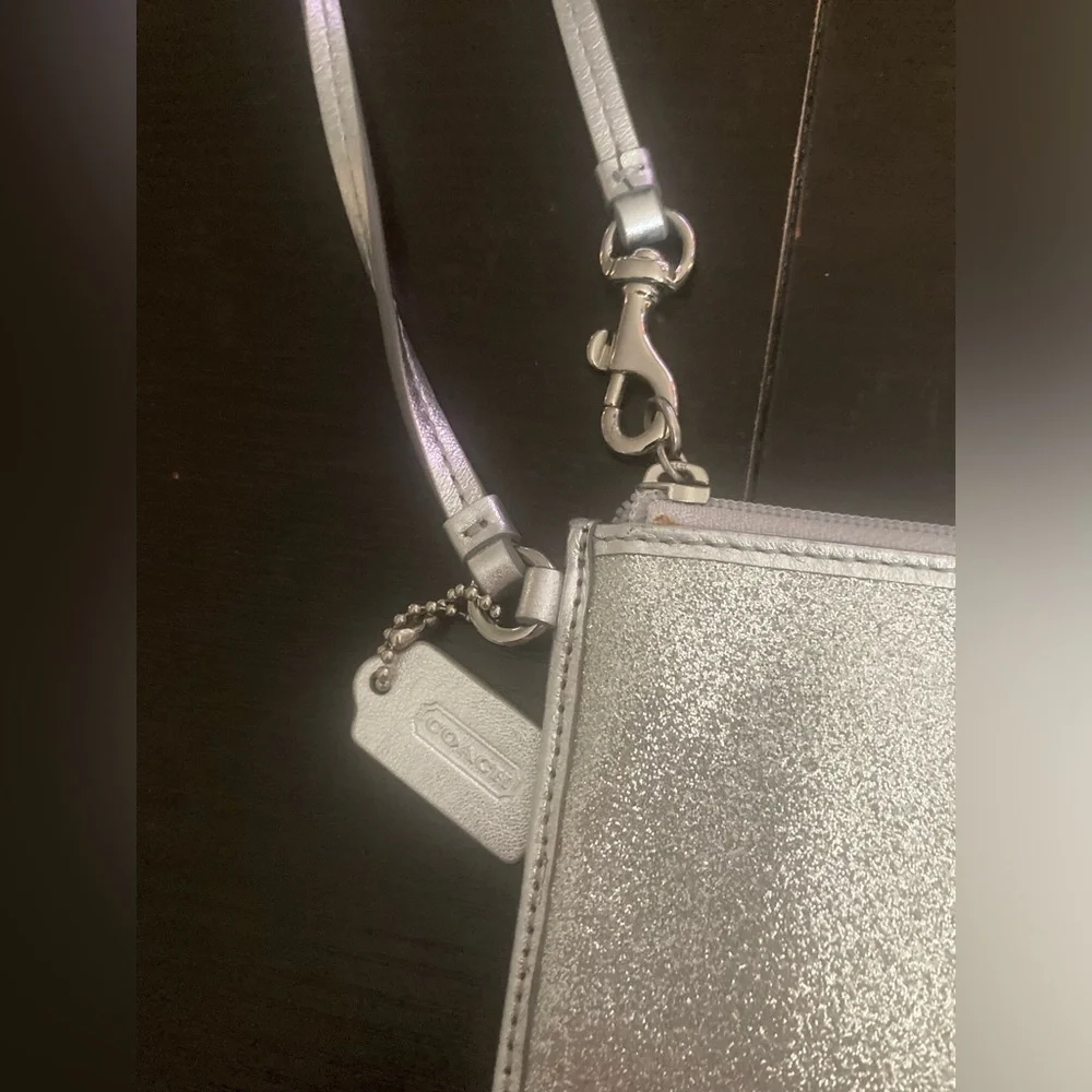 Coach Vintage glittery silver skinny zip wristlet wallet. Good used condition